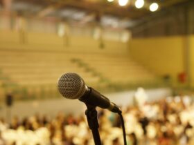 shallow focus photo of black corded microphone