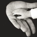 child and parent hands photography
