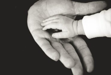 child and parent hands photography