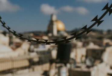 selective focus photography of black barbwire