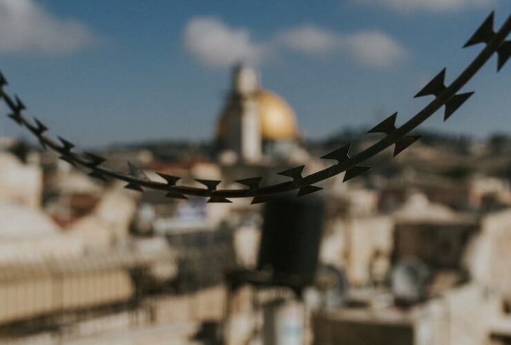 selective focus photography of black barbwire