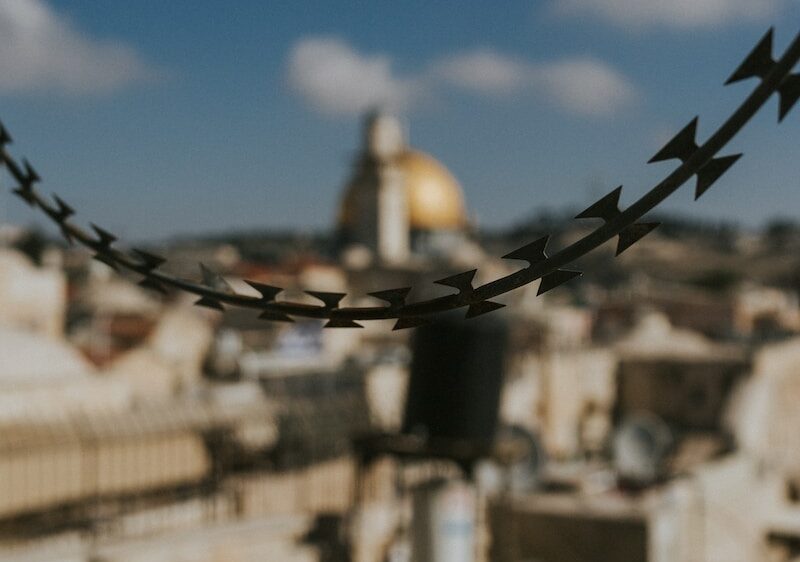 selective focus photography of black barbwire