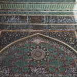 a close up of a building with a clock on it