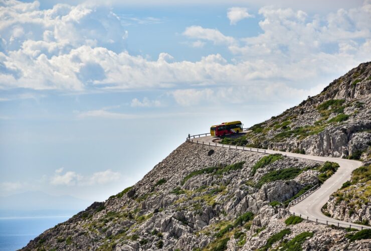 Bus Driving on a Narrow Cliff Road