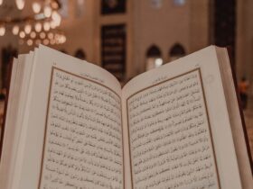 Islam scripture in Arabic language in person hand