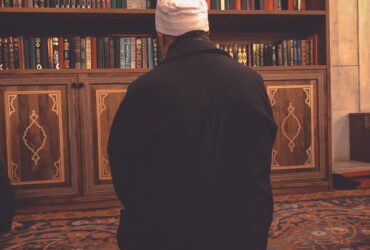 Man while Praying in Library