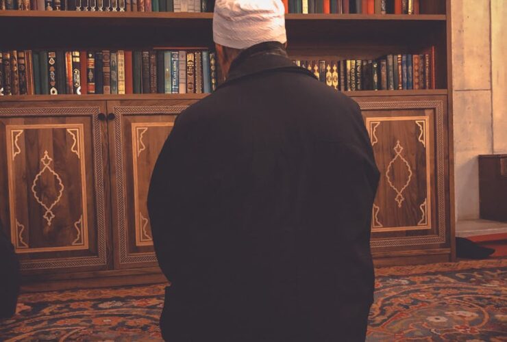Man while Praying in Library