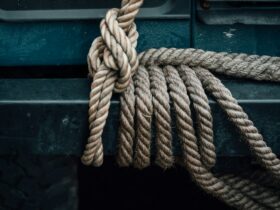 brown rope tied to vehicle