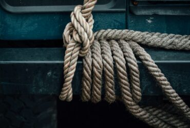 brown rope tied to vehicle