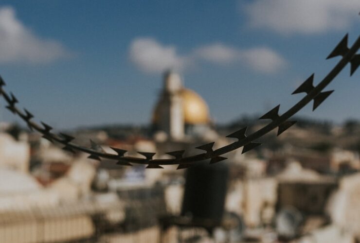 selective focus photography of black barbwire