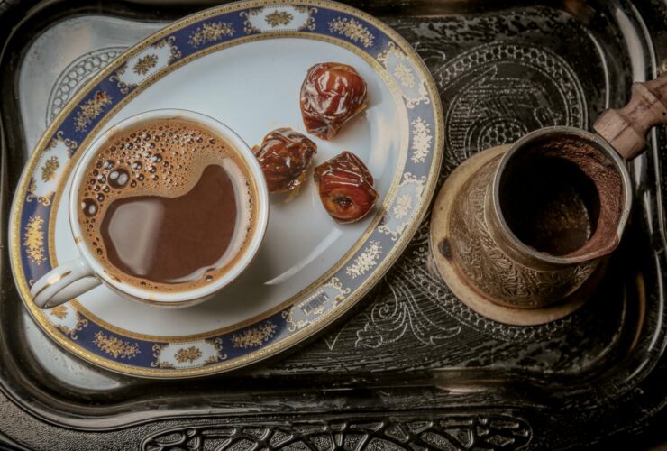 Cup Of Coffee With Dates On A Serving Tray