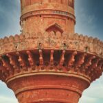 brown concrete tower under blue sky during daytime