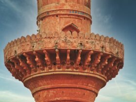 brown concrete tower under blue sky during daytime