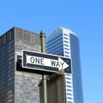 One Way signage on high-rise building