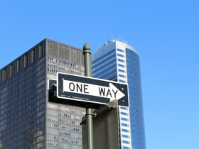One Way signage on high-rise building