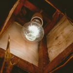 clear glass ball on brown wooden table