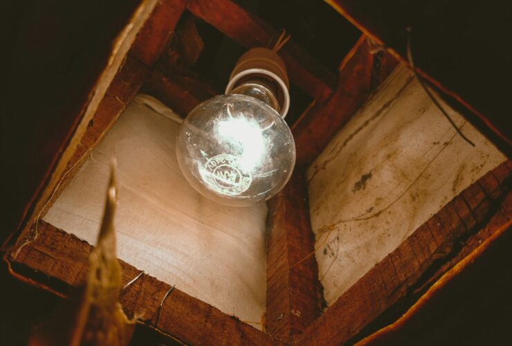 clear glass ball on brown wooden table