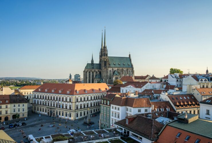 a view of a city with a cathedral in the background