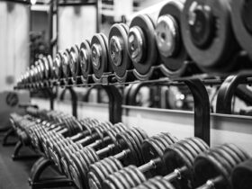 gray scale photo of dumbbells