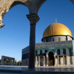 the dome of the rock in the middle of a courtyard