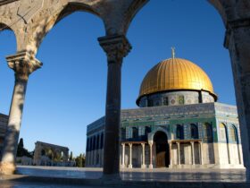 the dome of the rock in the middle of a courtyard