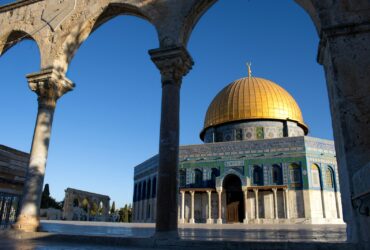 the dome of the rock in the middle of a courtyard