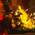 Close-up of a christmas tree with red and yellow lights