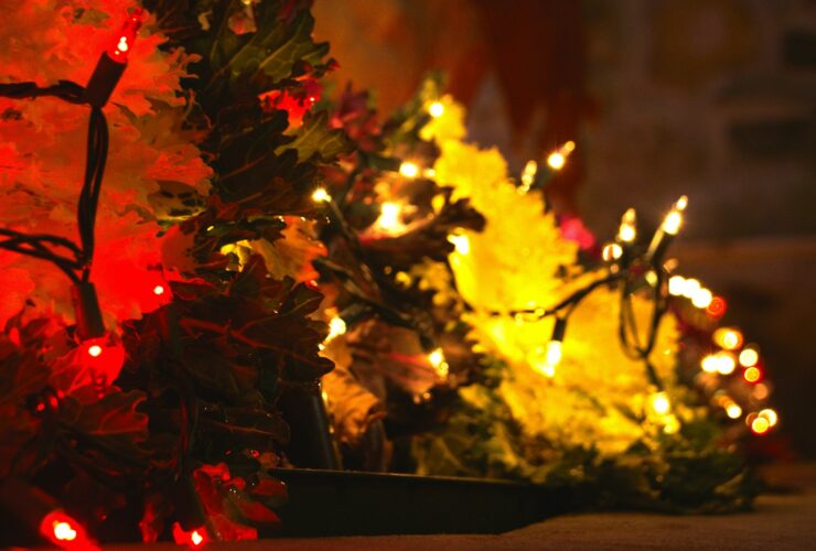 Close-up of a christmas tree with red and yellow lights