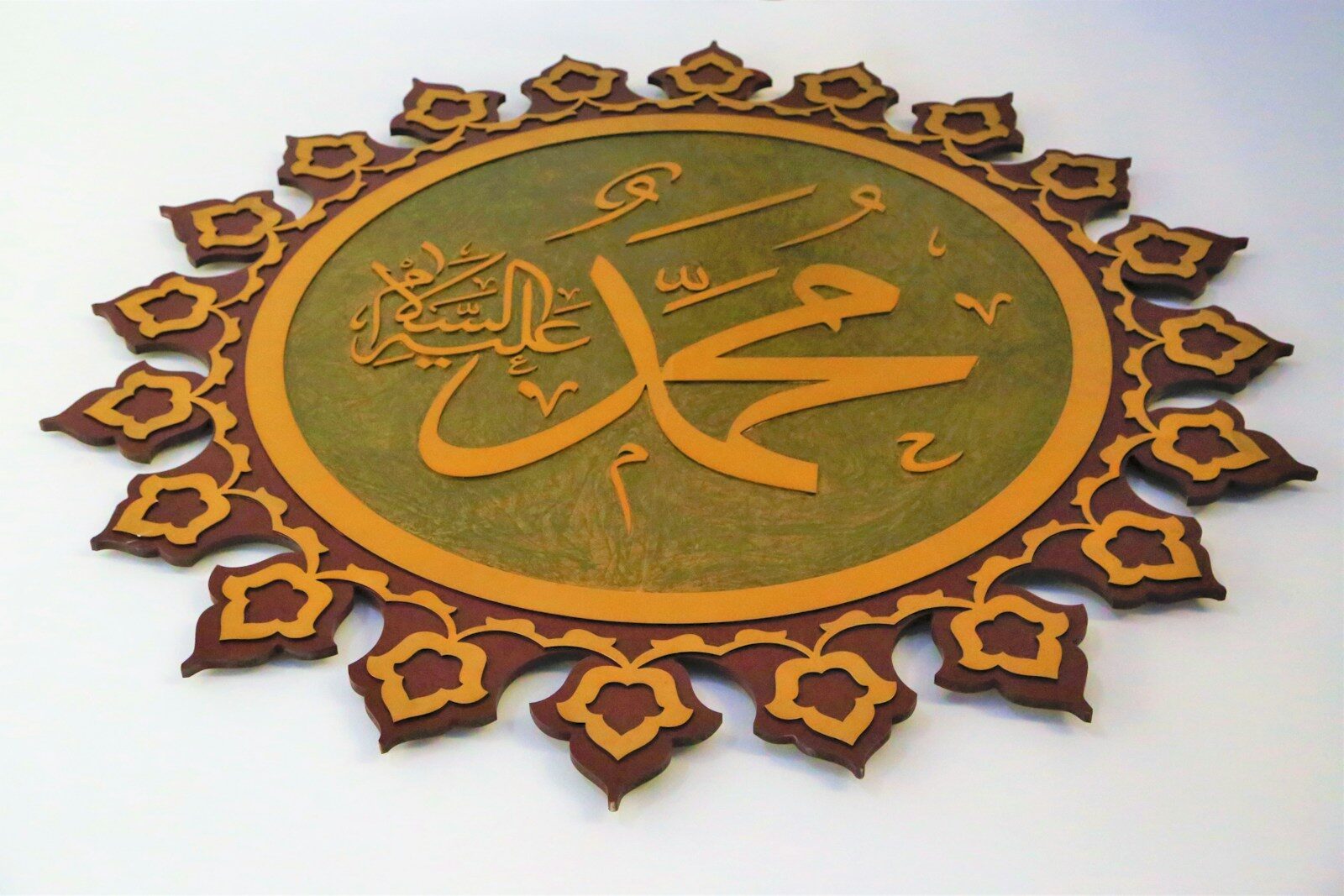 gold and black round wall decor