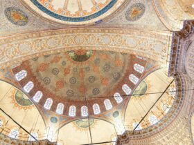 Intricate domes and ceiling adorn a historic mosque